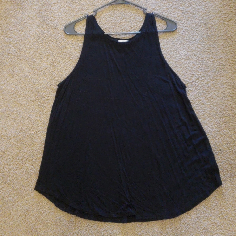 closer to the neck straps tank